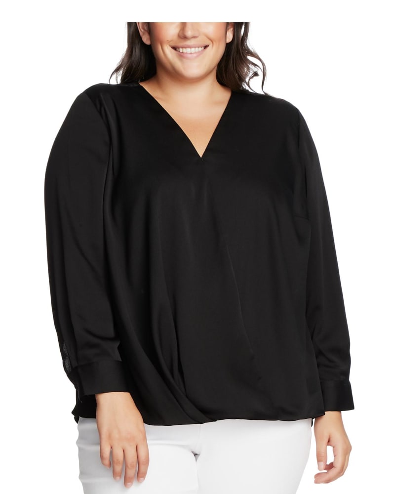 Front of a model wearing a size 2X Vince Camuto Women's Plus Hammered Satin V Neck Wrap Top Black Size 2X in Black by Vince Camuto. | dia_product_style_image_id:311543